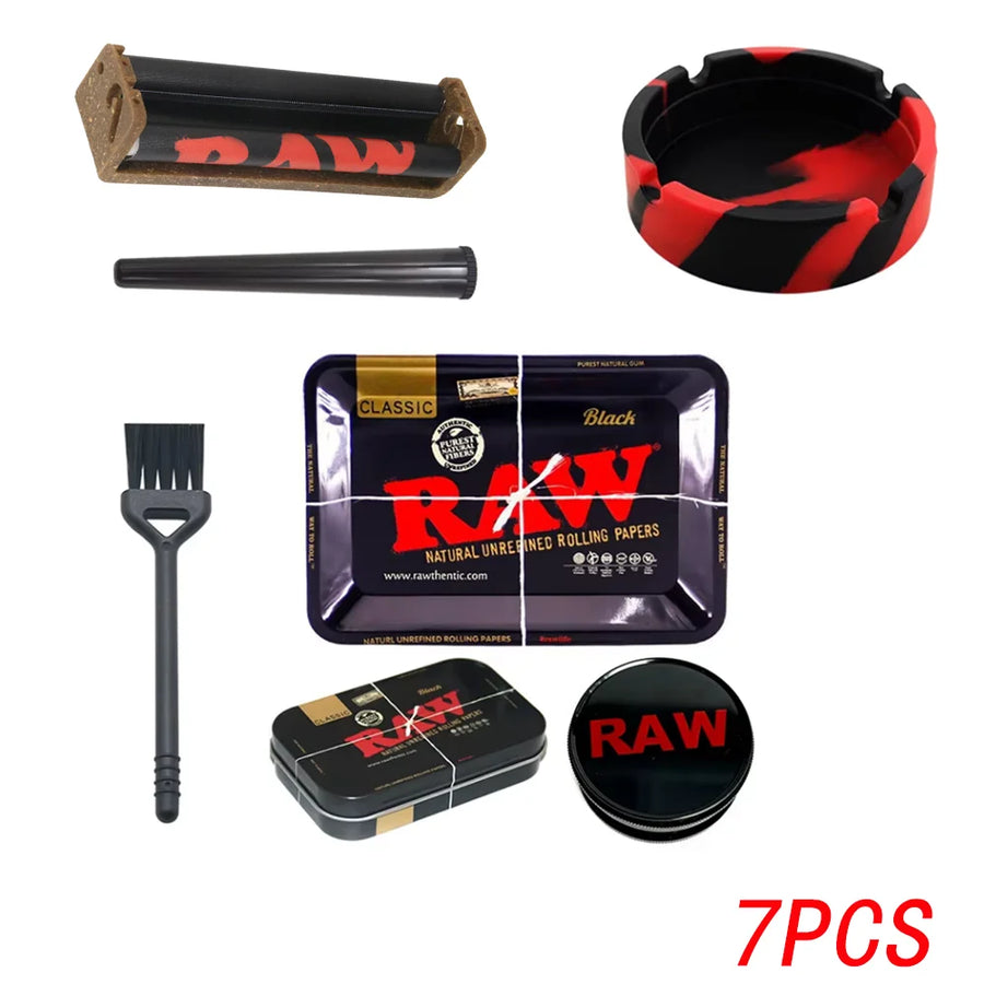 Collection of RAW smoking accessories including a tray, ashtray, and packaging on a white background.