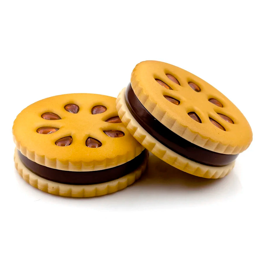 The Biscuit cookie grinder held in hand for scale