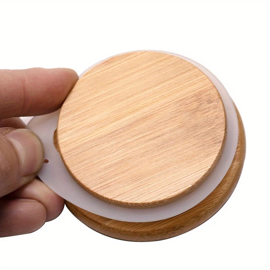 Wooden coaster held by a hand on a white background