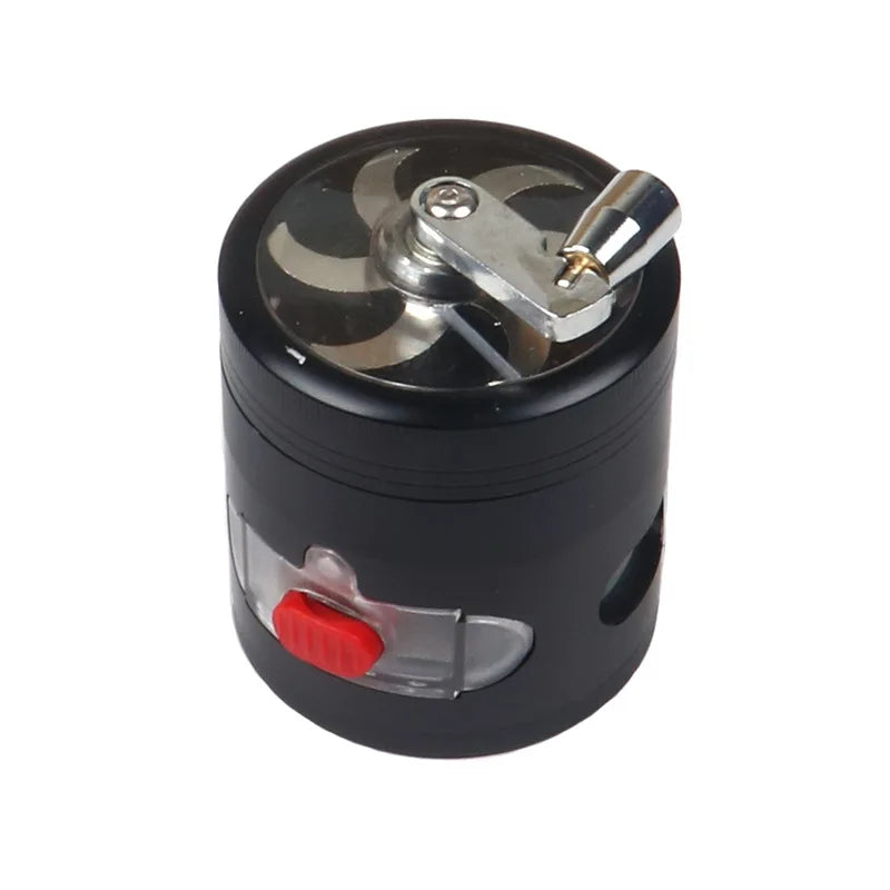 A black cylindrical electric grinder with a clear lid showing a silver metal fan, a red switch, and a small clear window.
