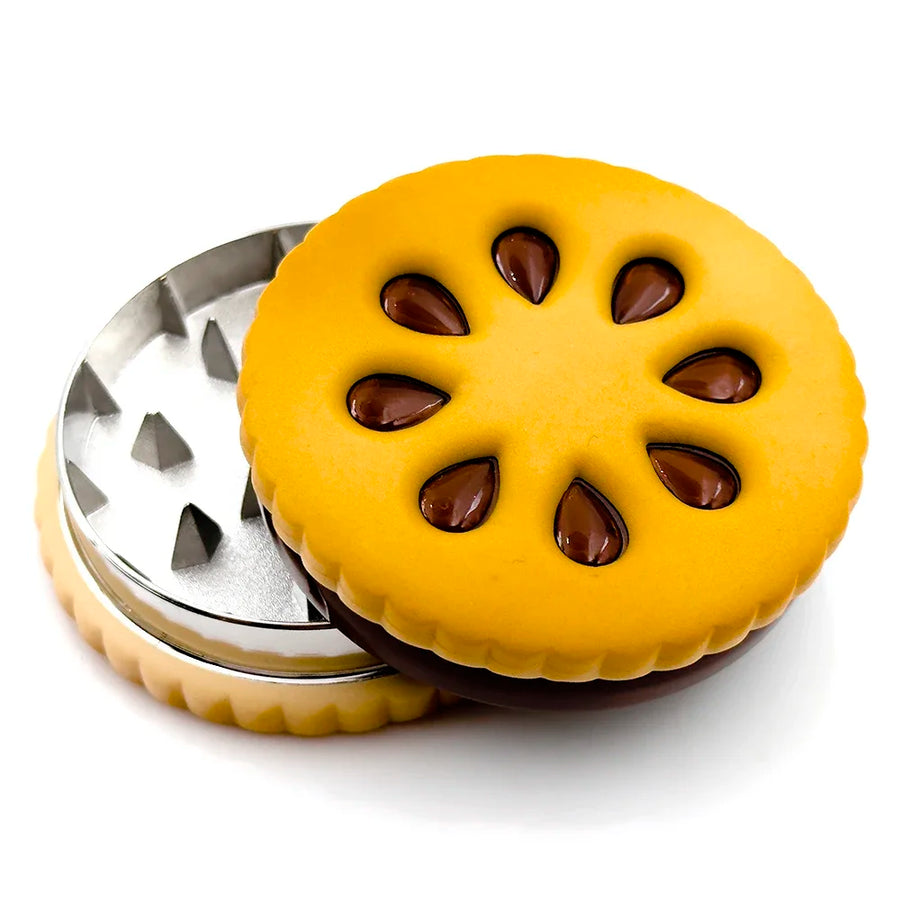 The Biscuit cookie-shaped metal herb grinder, closed