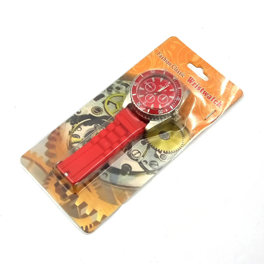 Red wristwatch with a red strap in packaging on a white background