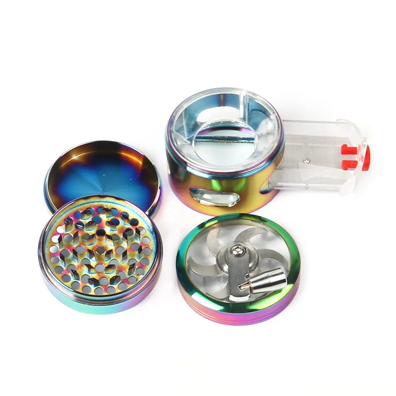 The Crank fully disassembled into four layers: cap, crank plate, toothed chamber and 